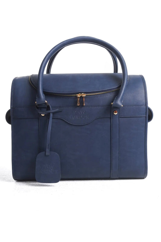Front view of the Kelly Airline Approved Pet Travel Carrier Bag by PAW LONDON in NAVY, showcasing its elegant design and branding.