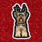 a sticker of a dog wearing reindeer antlers