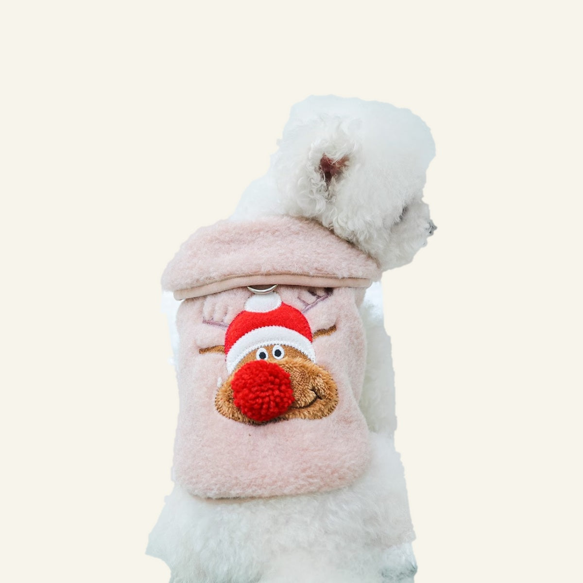 Dog wearing the pink reindeer vest, back view