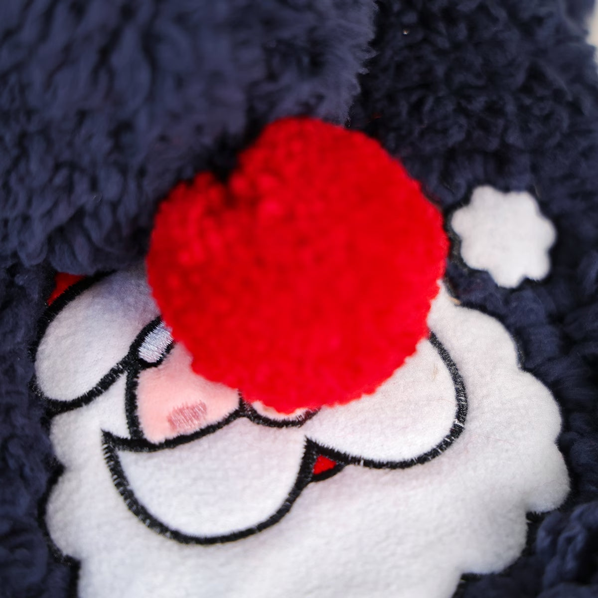 Santa patch and pompom detail